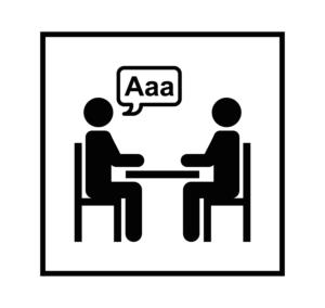 Dos personas sentadas. Una dice Aaa